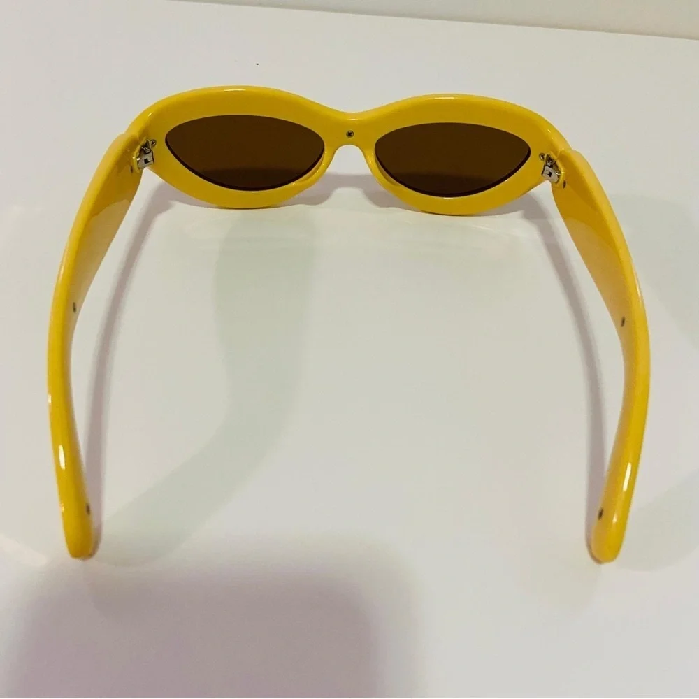 Luxury futuristic cat eye oval mustard pastel yellow steampunk sunglasses